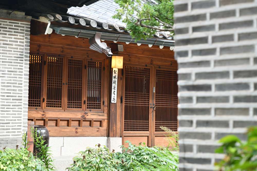 The outside of a traditional Korean house that was converted into a restaurant